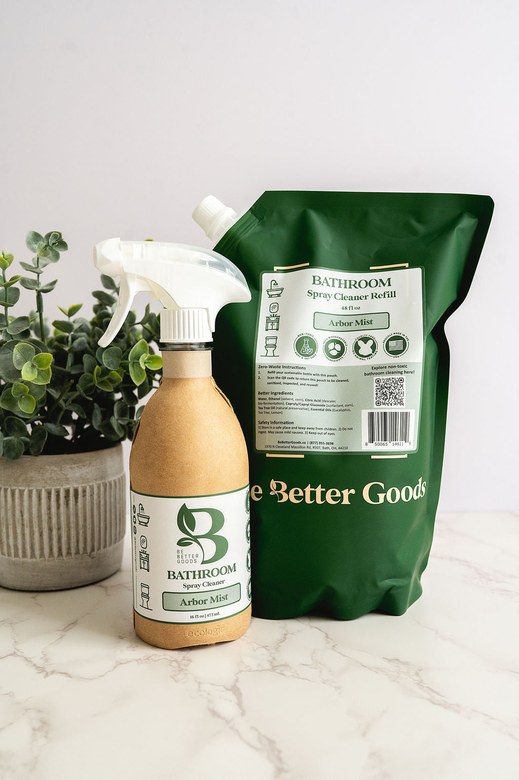 Bathroom spray cleaner lineup in 16 oz reduced-plastic spray bottle and 100% post consumer recycled refill pouch. 
