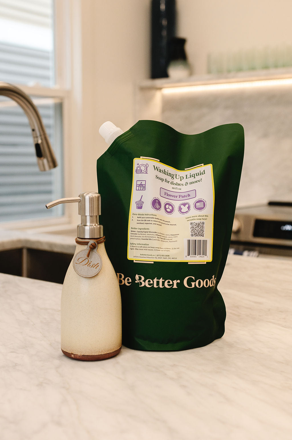 Plant-based, non-toxic dish soap in a ceramic pump bottle with a refill pouch made from 100% post-consumer recycled plastic. 